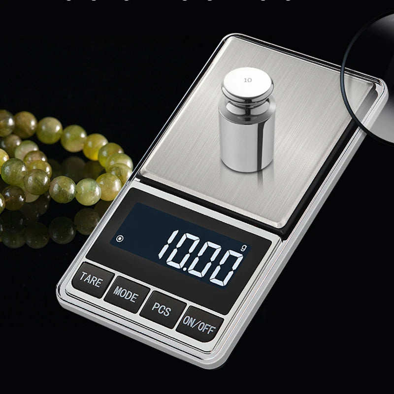 Digital pocket scale weighing a 10 gram calibration weight on stainless platform.