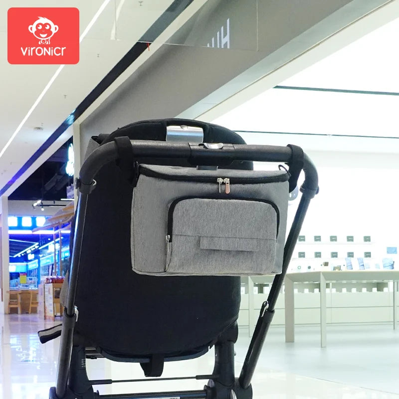 Hangs on almost any stroller