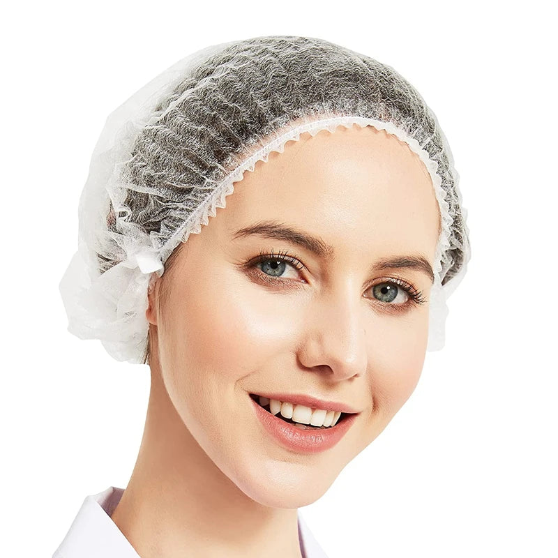 Adult model wearing a white disposable bouffant hair cap