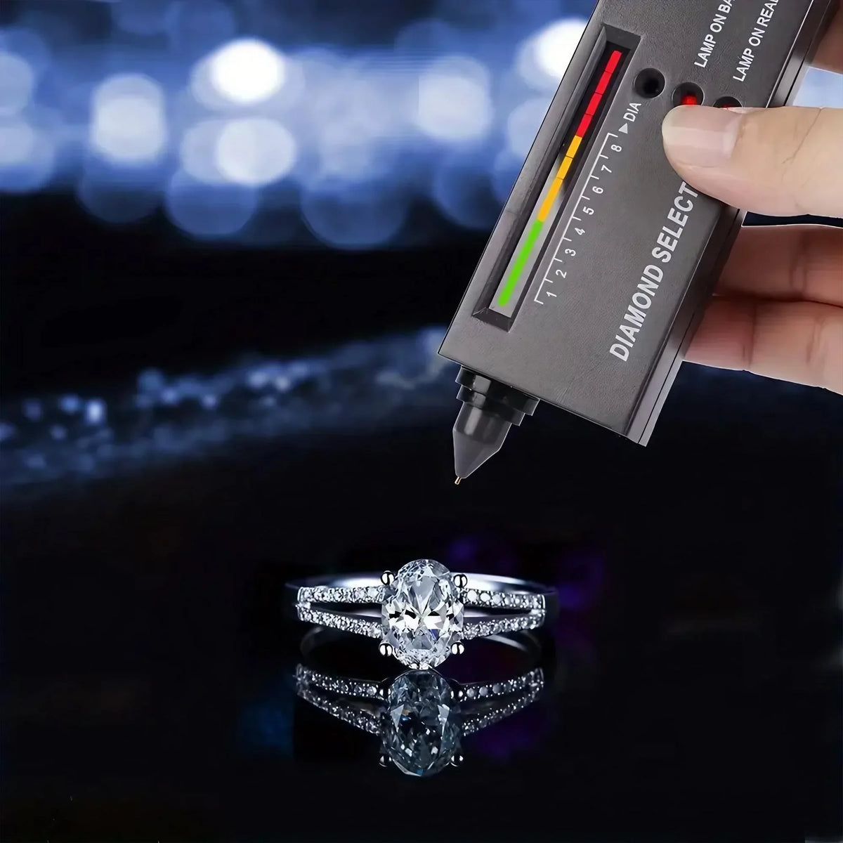 Diamond tester probe touching a stone set in a ring